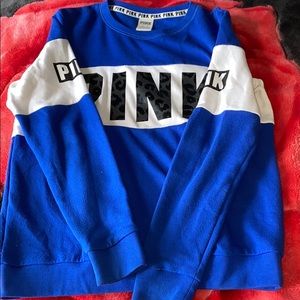 This is a crew neck from pink that is blue